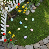 Easter eggs hidden in backyard garden